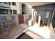 Enclosed patio featuring stone accent wall, rock garden, outdoor carpet and private entrance at 4120 N 78Th St # 116, Scottsdale, AZ 85251
