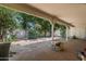 Covered patio area overlooking the well-maintained backyard at 4226 N 69Th Pl, Scottsdale, AZ 85251