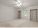 Spacious bedroom featuring a ceiling fan, and shelving at 4226 N 69Th Pl, Scottsdale, AZ 85251