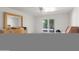 Bedroom with bright natural light, ceiling fan, and sliding glass door leading outside at 4226 N 69Th Pl, Scottsdale, AZ 85251