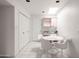 Bright dining area with modern lighting, adjacent to kitchen, and closet space at 4226 N 69Th Pl, Scottsdale, AZ 85251