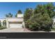Inviting two-story home featuring a two-car garage and desert landscaping at 4226 N 69Th Pl, Scottsdale, AZ 85251
