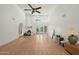 Open living room with tile floors, high ceilings, fireplace, and natural light at 4226 N 69Th Pl, Scottsdale, AZ 85251