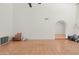 Minimalist living area featuring tile flooring and an arched doorway at 4226 N 69Th Pl, Scottsdale, AZ 85251