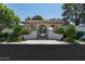 The pool entrance features a tile roof and landscaping at 4226 N 69Th Pl, Scottsdale, AZ 85251