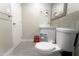 Bright bathroom with a toilet, sink vanity, and tiled flooring at 4255 N 68Th Dr, Phoenix, AZ 85033