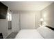 Comfortable bedroom featuring a cozy bed, closet, and neutral tones at 4255 N 68Th Dr, Phoenix, AZ 85033