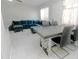 Dining room and sitting area featuring tile floors, neutral colors and furniture at 4255 N 68Th Dr, Phoenix, AZ 85033