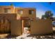 Charming two-story home with a gated entrance and lush landscaping at 4255 N 68Th Dr, Phoenix, AZ 85033