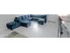 Cozy sitting area featuring light tile flooring, comfortable lounge furniture and an ottoman at 4255 N 68Th Dr, Phoenix, AZ 85033