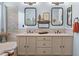 Bright bathroom features double sinks, neutral colors, tile backsplash, and large vanity at 4462 E Dale Ln, Cave Creek, AZ 85331