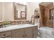Bathroom with a vanity and tub, decorated with modern tile, wood elements, and minimalist décor at 4462 E Dale Ln, Cave Creek, AZ 85331
