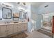 Bright bathroom with double vanity, sleek mirrors and ample counter space at 4462 E Dale Ln, Cave Creek, AZ 85331
