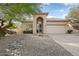 Inviting single-level home featuring desert landscaping, covered entryway, and a 2-car garage at 4462 E Dale Ln, Cave Creek, AZ 85331