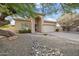 Charming single-story home with desert landscaping, arched entry and two car garage at 4462 E Dale Ln, Cave Creek, AZ 85331