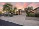 Inviting home with well-maintained landscaping, mature trees, and a spacious driveway at 4462 E Dale Ln, Cave Creek, AZ 85331