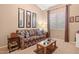Cozy living room featuring neutral walls, plush carpeting, and abundant natural light at 4462 E Dale Ln, Cave Creek, AZ 85331