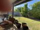 Covered patio with a view of a well-maintained lawn and garden at 4626 W Altadena Ave, Glendale, AZ 85304