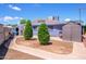 Fenced backyard with lush greenery and small storage shed, offering both beauty and practicality at 4626 W Altadena Ave, Glendale, AZ 85304