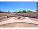 Spacious backyard with circular walkway and charming fire pit area, perfect for outdoor gatherings at 4626 W Altadena Ave, Glendale, AZ 85304