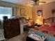 Bright bedroom with a makeup vanity, comfortable bed, and ceiling fan at 4626 W Altadena Ave, Glendale, AZ 85304