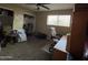 Bedroom with an open closet and a desk near the window, showing storage at 4626 W Altadena Ave, Glendale, AZ 85304