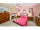 Spacious bedroom with ceiling fan, with bright walls and furniture set at 4626 W Altadena Ave, Glendale, AZ 85304