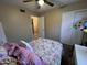 Bedroom with carpet, ceiling fan and closet, shown from bed level at 4626 W Altadena Ave, Glendale, AZ 85304
