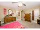 Spacious bedroom with ceiling fan, bright walls and furniture set at 4626 W Altadena Ave, Glendale, AZ 85304