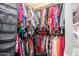 Organized walk-in closet with ample storage for clothes and accessories at 4626 W Altadena Ave, Glendale, AZ 85304