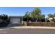 Single-Gathering home featuring a spacious driveway and classic design elements, offering comfortable living at 4626 W Altadena Ave, Glendale, AZ 85304