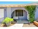 Charming front porch with seating and climbing plants, creating a welcoming entry at 4626 W Altadena Ave, Glendale, AZ 85304