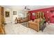 Comfortable living room with tile floors, ceiling fan, sofa, and eclectic decor at 4626 W Altadena Ave, Glendale, AZ 85304