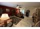 Spacious living room featuring tile flooring, ceiling fans, and comfortable furniture at 4626 W Altadena Ave, Glendale, AZ 85304