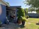 Back patio, covered, opens to the backyard with mature plants and a nice lawn at 4626 W Altadena Ave, Glendale, AZ 85304