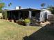 Charming covered patio with various potted plants, great for outdoor living at 4626 W Altadena Ave, Glendale, AZ 85304