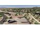 Panoramic aerial view showcases homes with tile roofs and desert landscaping at 4898 N 206Th Ln, Buckeye, AZ 85396