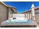 A luxurious hot tub nestled in a private area, perfect for relaxation and enjoying the outdoors at 4898 N 206Th Ln, Buckeye, AZ 85396