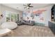Inviting living room with a comfortable sectional sofa and a colorful world map wall decor at 5712 E Blue Sky Dr, Scottsdale, AZ 85266