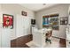 Bright home office with large window overlooking the yard, with custom cabinets, and modern desk at 5712 E Blue Sky Dr, Scottsdale, AZ 85266