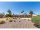 Attractive single-story home with desert landscaping and rock accents for curb appeal at 6532 E Aster Dr, Scottsdale, AZ 85254