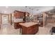 Beautiful kitchen with a large island, granite countertops, stainless steel appliances, and access to outdoor spaces at 6532 E Aster Dr, Scottsdale, AZ 85254