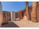 Practical side yard with storage shed and convenient access, enclosed by mature trees at 6532 E Aster Dr, Scottsdale, AZ 85254