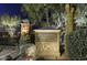 Superstition Mountain Golf and Country Club entrance with stone pillar, sign, and gate, exuding exclusivity and luxury at 6551 E Flat Iron Loop, Gold Canyon, AZ 85118