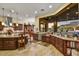 Gourmet kitchen with stainless steel appliances, custom cabinets, and an amazing view of the backyard at 6551 E Flat Iron Loop, Gold Canyon, AZ 85118