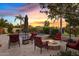Beautiful backyard with a fire pit, outdoor seating, and a scenic mountain view at 6706 S Jacqueline Way, Gilbert, AZ 85298