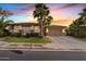Charming single-story home featuring a two-car garage and well-manicured landscaping at 6706 S Jacqueline Way, Gilbert, AZ 85298