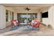 Comfortable covered patio with stylish seating, ideal for outdoor entertaining and relaxation at 6706 S Jacqueline Way, Gilbert, AZ 85298