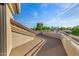 Private balcony with serene neighborhood views and a cool, shaded space at 7439 E Beryl Ave, Scottsdale, AZ 85258