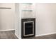 Close up of a built-in bar with a wine fridge and glass shelving at 7439 E Beryl Ave, Scottsdale, AZ 85258